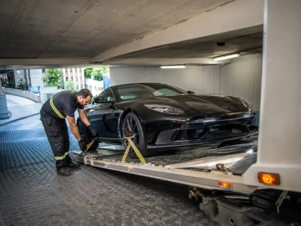 Low clearance towing Sydney service recovering a sports car from an underground car park